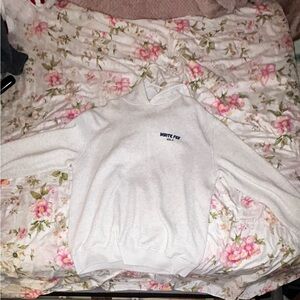 White fox gray and navy blue hoodie.